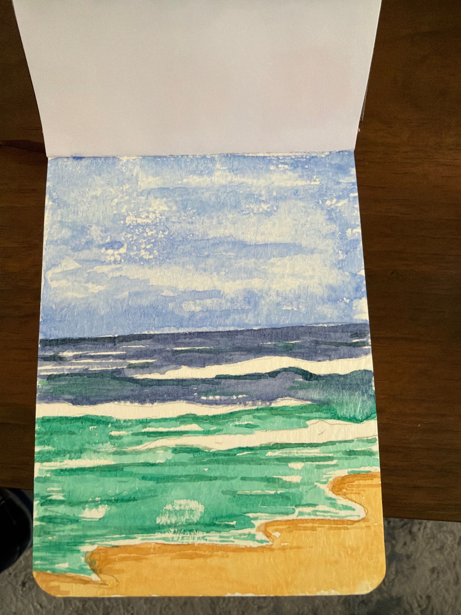 Seascape watercolor, first washes of sky, sea, and sand